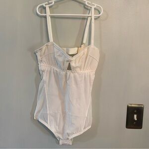 We are HAH Under the Wire Mesh Bodysuit in Walking on Eggshells white small